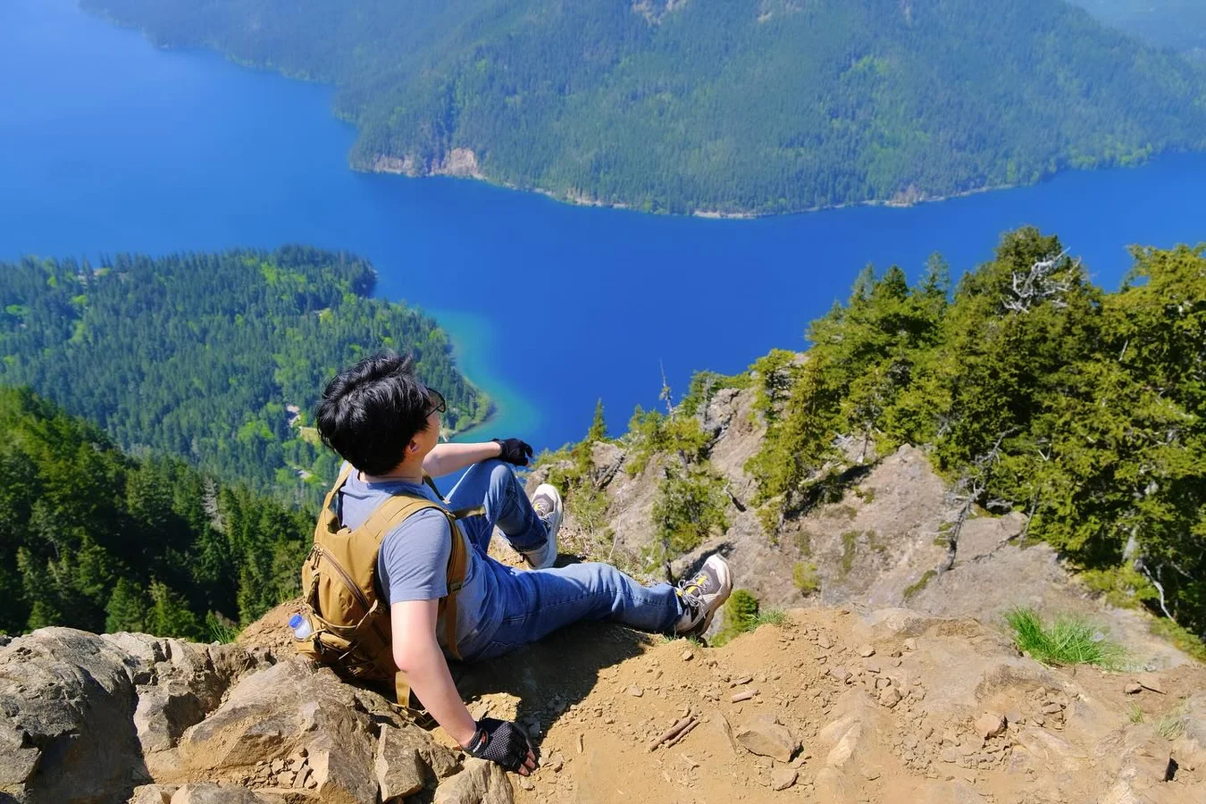 Resting on a ridge above an alpine lake
